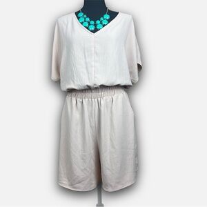 CHERISH SELF - V-Neck Open Back Loose Fit Beige Romper with Deep Front Pockets